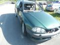 Kuva 1: Toyota Avensis 1.6 Farm. -98 1998