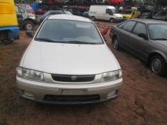 Mazda 323 1,5 sedan -97