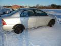 Kuva 1: Toyota Corolla 1.4 VVti sed. -02 2002