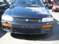 Kuva 1: Mazda 323 1.5i 16v familia 1996