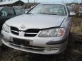 Kuva 1: Nissan Almera 1.5 -00 hopea 5-ov hb 2000