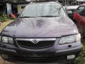 Kuva 1: Mazda 626 1.8 farmari lila -99 1999