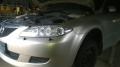 Kuva 1: Mazda 6 2.0 -05 beige farmari 2005