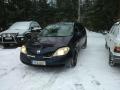 Kuva 1: Nissan Primera 1,6 HB sininen -03 2003