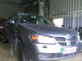 Kuva 1: Nissan Almera 1,5 -03 sedan t.harm 2003