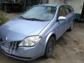 Kuva 1: Nissan Primera 1,6 -05 farmari v.sin 2005