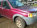 Kuva 1: Land Rover Freelander 1,8 16v tummanpunainen 2000