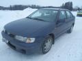 Kuva 1: Nissan Almera 1.4 sed. -00 2000