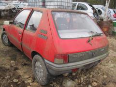 Peugeot 205 1,4 -91 HB 3-ovinen punainen