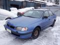 Kuva 1: Toyota Carina E 5D LB 1.8 GLi MT5 Engl. 1996