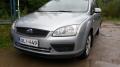 Kuva 1: Ford Focus 1.6 -05 farmari hopea 2005