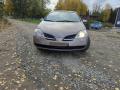 Kuva 1: Nissan Primera 1,6 5D HB -06 2006