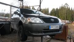 Toyota Corolla 1,4 -03 sedan t.harmaa turkki
