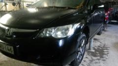 Honda Civic 4 dr HYBRID 1,3 aut. -08 musta sedan