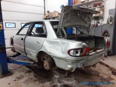 Mitsubishi Lancer 1.6 GLXI-16V-S-CB4A/250 sedan -96