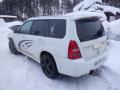 Kuva 1: Subaru Forester SG STi 5D SUV 2.5T MT6 AWD 2004