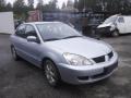 Kuva 1: Mitsubishi Lancer VII 4D Sedan 1.6i MT5 Invite 2005