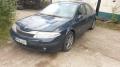 Kuva 1: Renault Laguna 1,6 -03 5-ov Hb sininen 2003