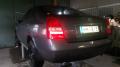 Kuva 1: Nissan Primera 1,8 -06 5-ov t.harmaa 2006