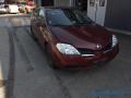 Kuva 1: Nissan Primera 1,6 -03 2003