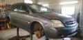 Kuva 1: Opel Vectra C -05 1.8 farmari tumman harmaa 2005