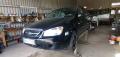 Kuva 1: Kia Cerato 1.6 -06 t-5-ov HB musta 2006