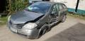 Kuva 1: Nissan Primera 2.2dCi -05 FARMARI harmaa 2005