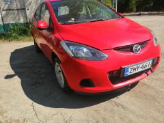 Mazda 21,3 -10 5-ov HB kirkkaanpunainen