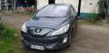 Kuva 1: Peugeot 308 1,6 HDI -08 t.harmaa HB 5-ov 2008