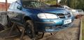 Kuva 1: Nissan Almera 1,5 -02 5-ov HB turkoosi 2002