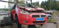 Kuva 1: Fiat Grande Punto 1,4 -08 punainen 5-ov. HB 2008