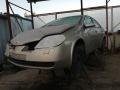 Kuva 1: Nissan Primera 1.8 -02 beige sedan 2002