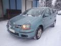 Kuva 1: Nissan Almera Tino V10 5D MPV 1.8i MT5 2003