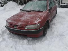 Peugeot 306  TD -97 punainen 5-ovinen 