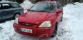 Kuva 1: Kia Rio 1,3  -04 5-ov HB punainen 2004