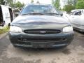 Kuva 1: Ford Escort 1.8i zetec 16v HB 1997