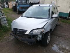 Mazda 2 1.4 -04 hopea farmari
