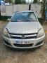 Kuva 1: Opel Astra H 1.8  -06 farmari hopea 2006