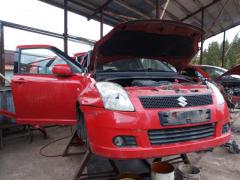 Suzuki Swift 1,3 -06 5-ov HB kirkkaanpunainen