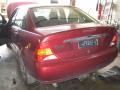 Kuva 1: Ford Focus 1.6i 16v 74kw sedan ghia 1999