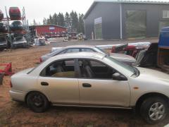 Mazda 323 1,5 sedan -97