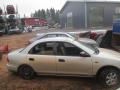 Kuva 2: Mazda 323 1,5 sedan -97  1997