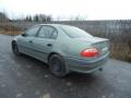 Kuva 2: Toyota Avensis 1.8 VVti sedan -02 2002