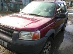 Land Rover Freelander 1,8 16v tummanpunainen