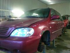Kia Carnival 2,9 crdi -04 punainen