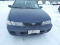 Kuva 2: Nissan Almera 1.4 sed. -00 2000