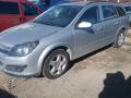 Kuva 2: Opel Astra H station wagon 1.8 2006