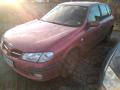 Kuva 2: Nissan Almera (N16) 1.8i -00 Hatchback 2000