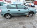 Kuva 2: Nissan Almera (N16) 1.5 Twin cam 16V Hatchback  2002