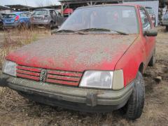 Peugeot 205 1,4 -91 HB 3-ovinen punainen